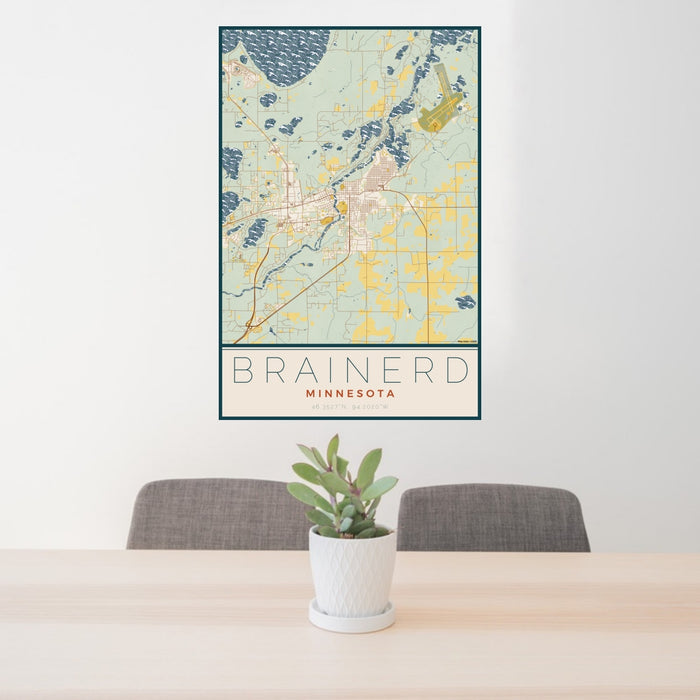 24x36 Brainerd Minnesota Map Print Portrait Orientation in Woodblock Style Behind 2 Chairs Table and Potted Plant