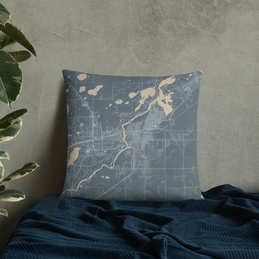 Custom Brainerd Minnesota Map Throw Pillow in Afternoon on Bedding Against Wall