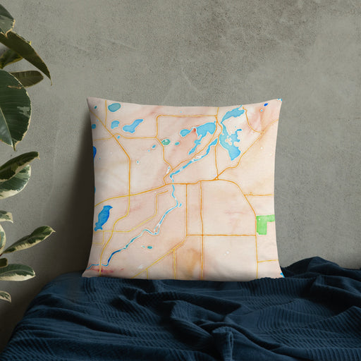 Custom Brainerd Minnesota Map Throw Pillow in Watercolor on Bedding Against Wall