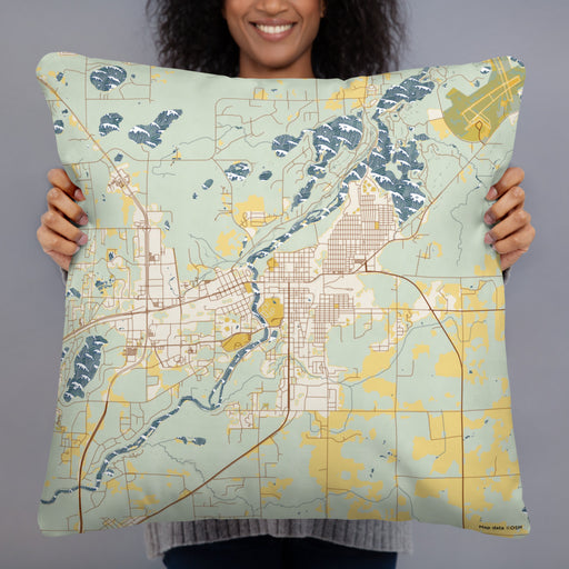 Person holding 22x22 Custom Brainerd Minnesota Map Throw Pillow in Woodblock