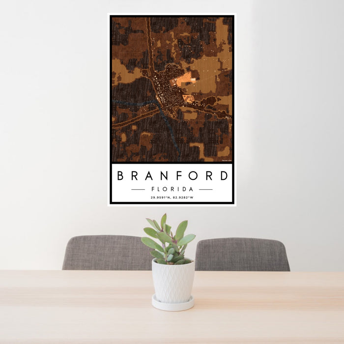 24x36 Branford Florida Map Print Portrait Orientation in Ember Style Behind 2 Chairs Table and Potted Plant