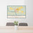 24x36 Branford Florida Map Print Lanscape Orientation in Woodblock Style Behind 2 Chairs Table and Potted Plant