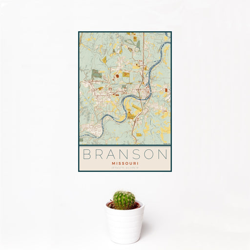 12x18 Branson Missouri Map Print Portrait Orientation in Woodblock Style With Small Cactus Plant in White Planter