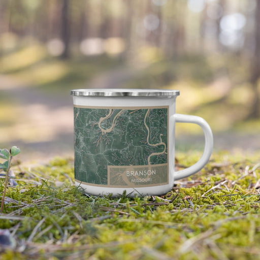 Right View Custom Branson Missouri Map Enamel Mug in Afternoon on Grass With Trees in Background