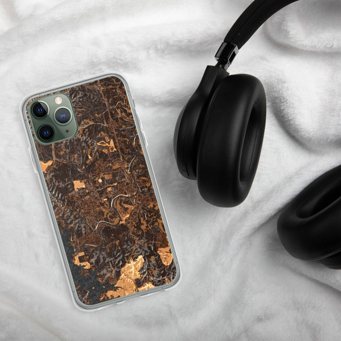 Custom Branson Missouri Map Phone Case in Ember on Table with Black Headphones