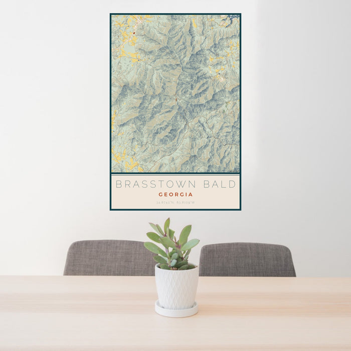 24x36 Brasstown Bald Georgia Map Print Portrait Orientation in Woodblock Style Behind 2 Chairs Table and Potted Plant
