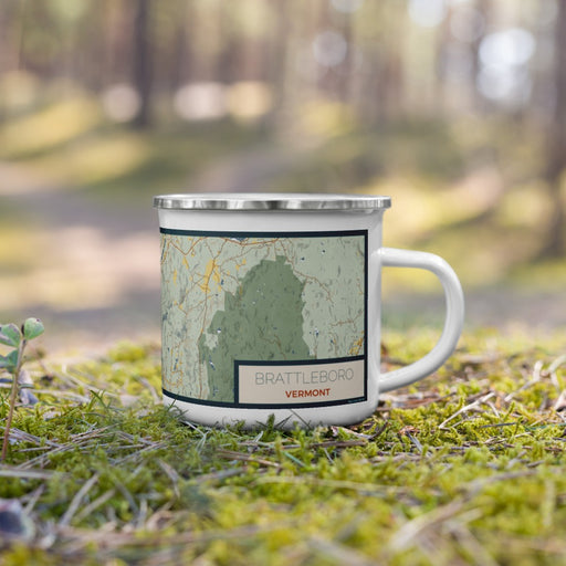 Right View Custom Brattleboro Vermont Map Enamel Mug in Woodblock on Grass With Trees in Background