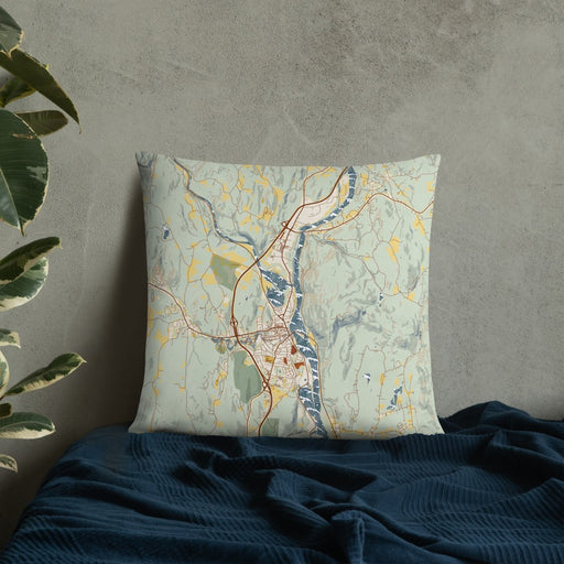 Custom Brattleboro Vermont Map Throw Pillow in Woodblock on Bedding Against Wall