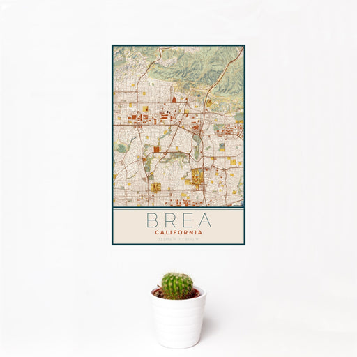 12x18 Brea California Map Print Portrait Orientation in Woodblock Style With Small Cactus Plant in White Planter