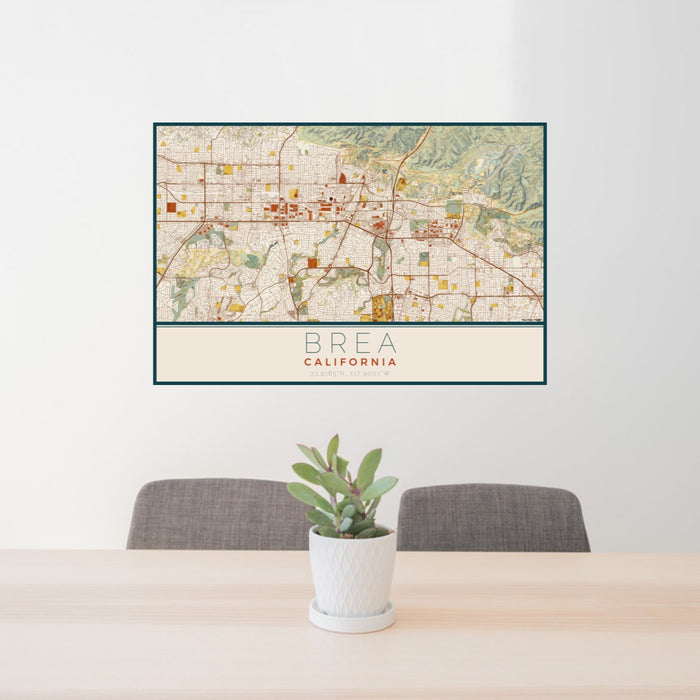 24x36 Brea California Map Print Lanscape Orientation in Woodblock Style Behind 2 Chairs Table and Potted Plant