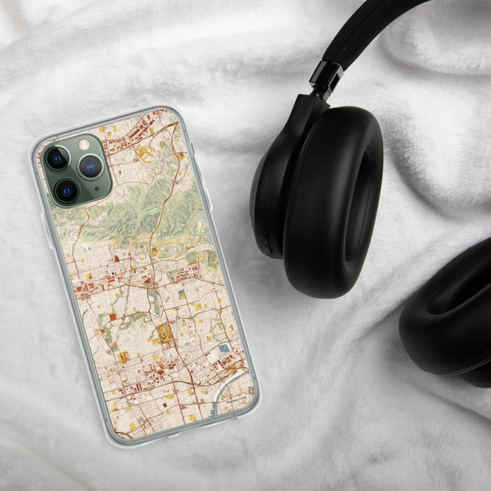 Custom Brea California Map Phone Case in Woodblock on Table with Black Headphones