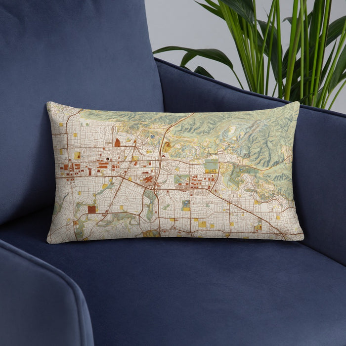 Custom Brea California Map Throw Pillow in Woodblock on Blue Colored Chair