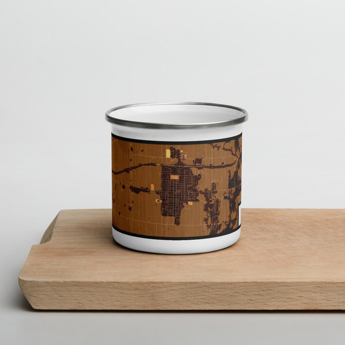 Front View Custom Breese Illinois Map Enamel Mug in Ember on Cutting Board