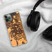 Custom Brentwood California Map Phone Case in Ember on Table with Black Headphones