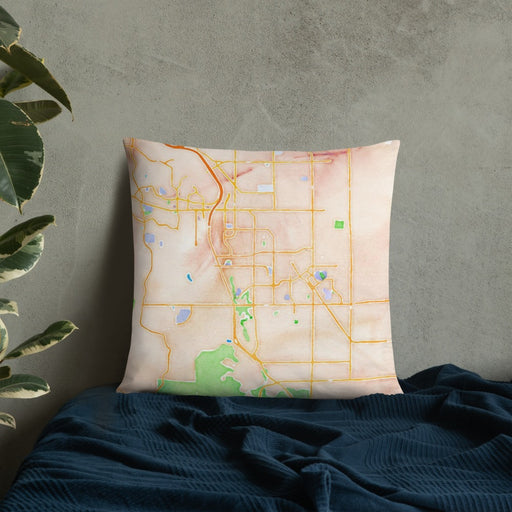 Custom Brentwood California Map Throw Pillow in Watercolor on Bedding Against Wall