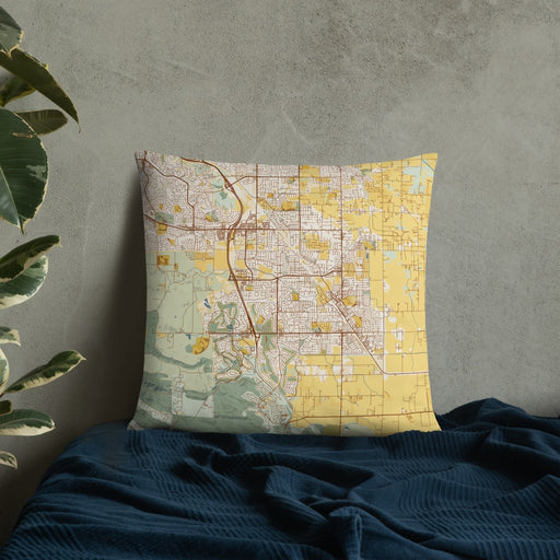 Custom Brentwood California Map Throw Pillow in Woodblock on Bedding Against Wall