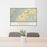 24x36 Brevard North Carolina Map Print Lanscape Orientation in Woodblock Style Behind 2 Chairs Table and Potted Plant