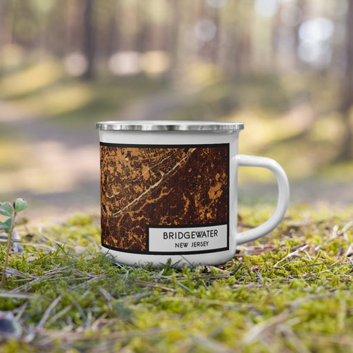 Right View Custom Bridgewater New Jersey Map Enamel Mug in Ember on Grass With Trees in Background