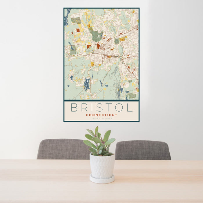 24x36 Bristol Connecticut Map Print Portrait Orientation in Woodblock Style Behind 2 Chairs Table and Potted Plant