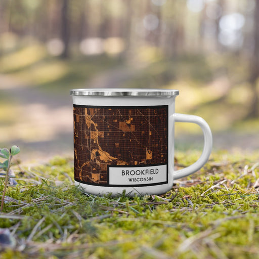 Right View Custom Brookfield Wisconsin Map Enamel Mug in Ember on Grass With Trees in Background