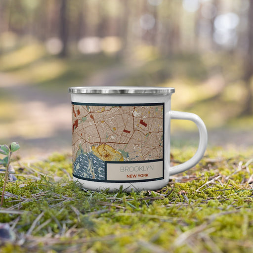 Right View Custom Brooklyn New York Map Enamel Mug in Woodblock on Grass With Trees in Background