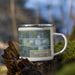 Right View Custom Brookshire Texas Map Enamel Mug in Afternoon on Grass With Trees in Background