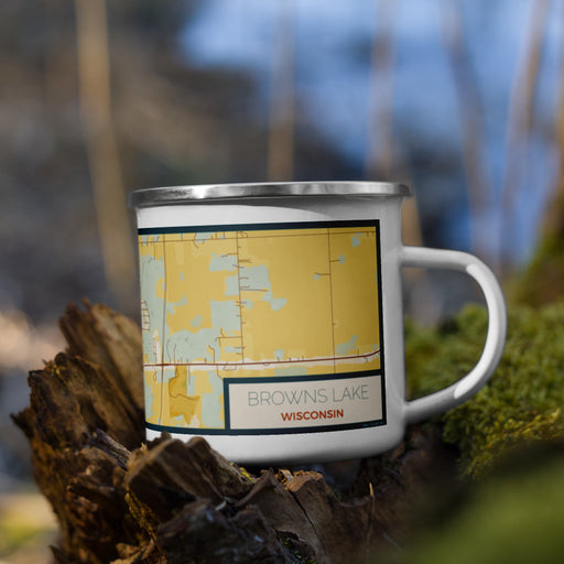 Right View Custom Browns Lake Wisconsin Map Enamel Mug in Woodblock on Grass With Trees in Background