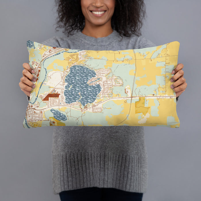 Person holding 20x12 Custom Browns Lake Wisconsin Map Throw Pillow in Woodblock