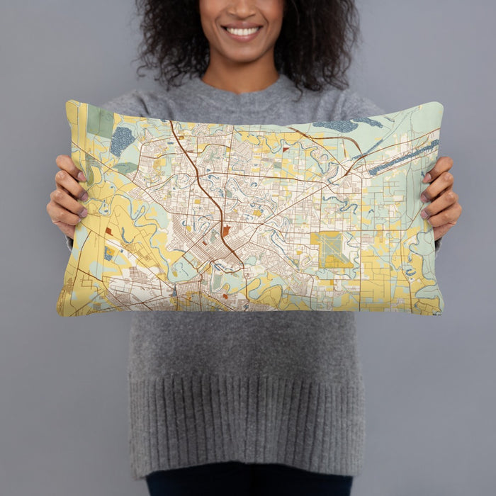Person holding 20x12 Custom Brownsville Texas Map Throw Pillow in Woodblock