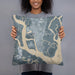 Person holding 18x18 Custom Brunswick Georgia Map Throw Pillow in Afternoon