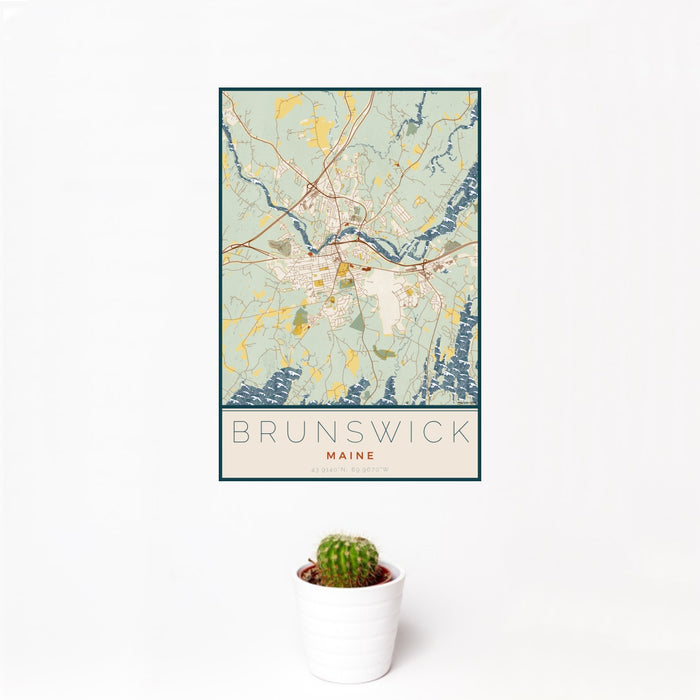 12x18 Brunswick Maine Map Print Portrait Orientation in Woodblock Style With Small Cactus Plant in White Planter