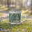 Right View Custom Brunswick Maine Map Enamel Mug in Afternoon on Grass With Trees in Background