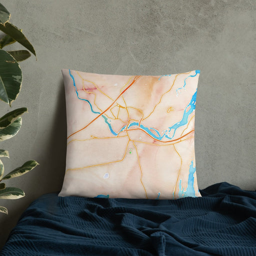 Custom Brunswick Maine Map Throw Pillow in Watercolor on Bedding Against Wall