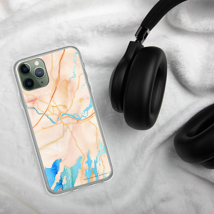 Custom Brunswick Maine Map Phone Case in Watercolor on Table with Black Headphones