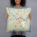 Person holding 18x18 Custom Brunswick Maine Map Throw Pillow in Woodblock
