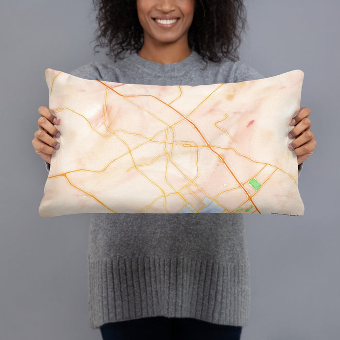 Person holding 20x12 Custom Bryan Texas Map Throw Pillow in Watercolor