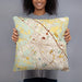 Person holding 18x18 Custom Bryan Texas Map Throw Pillow in Woodblock