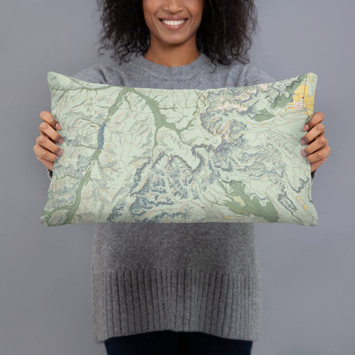 Person holding 20x12 Custom Bryce Canyon National Park Map Throw Pillow in Woodblock