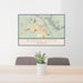 24x36 Buena Vista Colorado Map Print Lanscape Orientation in Woodblock Style Behind 2 Chairs Table and Potted Plant