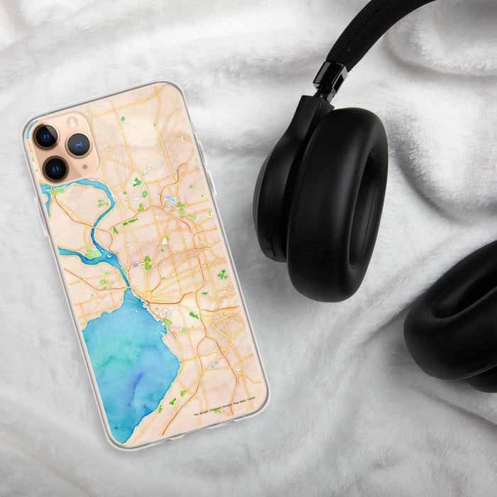 Custom Buffalo New York Map Phone Case in Watercolor on Table with Black Headphones