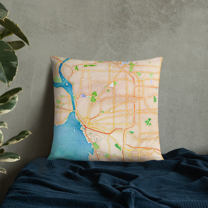 Custom Buffalo New York Map Throw Pillow in Watercolor on Bedding Against Wall