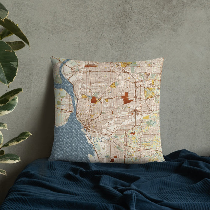 Custom Buffalo New York Map Throw Pillow in Woodblock on Bedding Against Wall