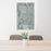 24x36 Bullhead City Arizona Map Print Portrait Orientation in Afternoon Style Behind 2 Chairs Table and Potted Plant