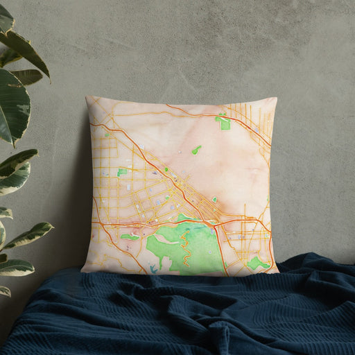 Custom Burbank California Map Throw Pillow in Watercolor on Bedding Against Wall