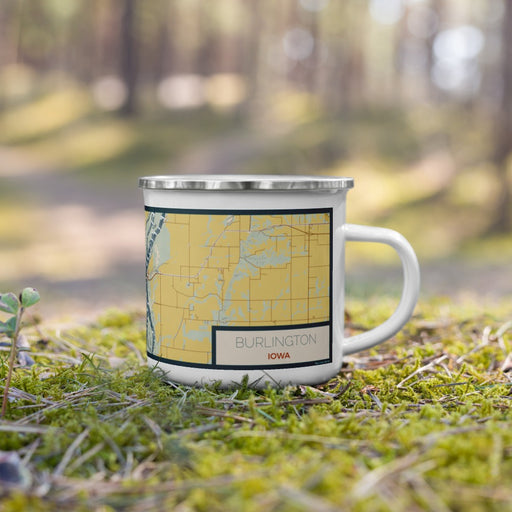Right View Custom Burlington Iowa Map Enamel Mug in Woodblock on Grass With Trees in Background