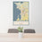 24x36 Burlington Vermont Map Print Portrait Orientation in Woodblock Style Behind 2 Chairs Table and Potted Plant