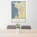 24x36 Burlington Vermont Map Print Portrait Orientation in Woodblock Style Behind 2 Chairs Table and Potted Plant