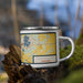 Right View Custom Burlington Wisconsin Map Enamel Mug in Woodblock on Grass With Trees in Background
