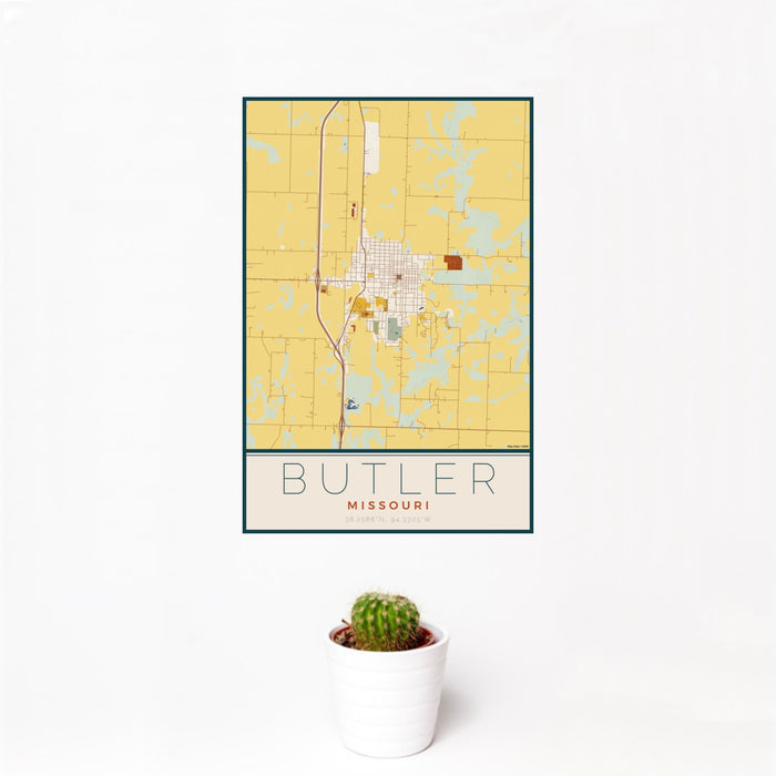 12x18 Butler Missouri Map Print Portrait Orientation in Woodblock Style With Small Cactus Plant in White Planter