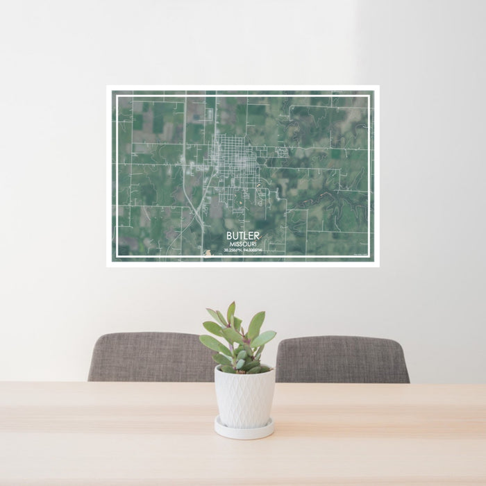 24x36 Butler Missouri Map Print Lanscape Orientation in Afternoon Style Behind 2 Chairs Table and Potted Plant